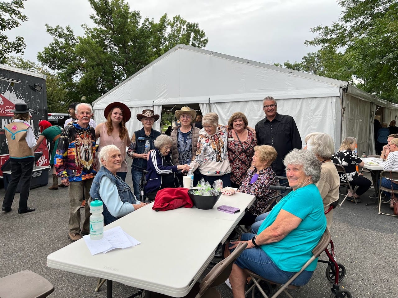 71 - WWW week with staff and residents a large tree in the middle of the grass